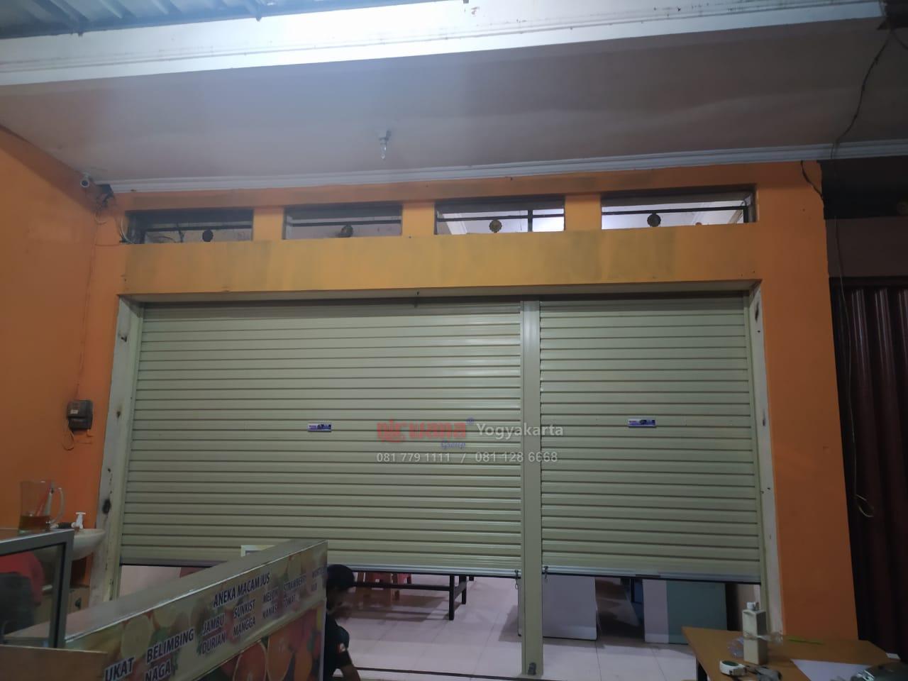 Pemasangan Pintu  Rolling Door One Sheet Bluescope Polos di 