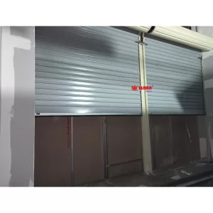 Pemasangan Rolling Door One Sheet 30cm Perforated di Ayam Pemuda Pakuwon Trade Center Surabaya