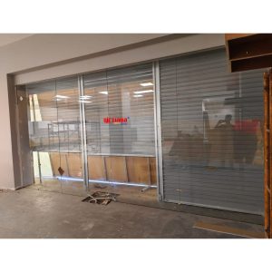 Pemasangan Rolling Door One Sheet 70cm Perforated di Erafone Plaza Udayana Mall Bali