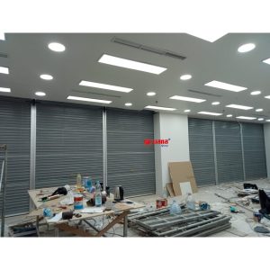 Pemasangan Rolling Door One Sheet Full Perforated di Ibox Big Mall Samarinda, Kalimantan Timur. 
