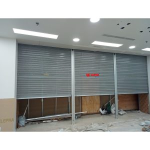 Pemasangan Rolling Door One Sheet Full Perforated di Ibox Big Mall Samarinda, Kalimantan Timur. 