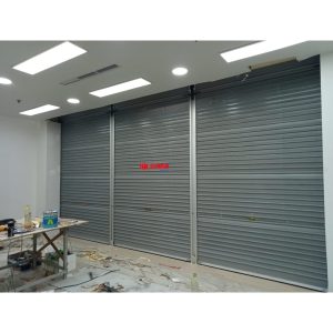 Pemasangan Rolling Door One Sheet Full Perforated di Ibox Big Mall Samarinda, Kalimantan Timur. 