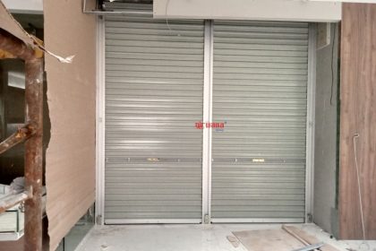 Pemasangan Rolling Door One Sheet Full Perforated di Optik Melawai Plaza Malioboro