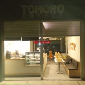 Pemasangan Rolling Door One Sheet Full Perforated di Tomoro Coffee Bypass Ngurah Rai, Bali oleh Nirwana Group Surabaya