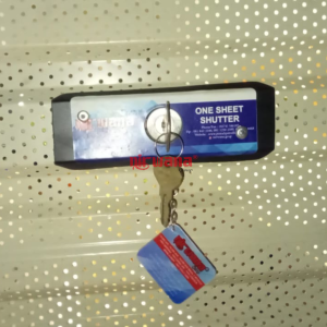 Pemasangan Rolling Door One Sheet Full Perforated di Tomoro Coffee Bypass Ngurah Rai, Bali oleh Nirwana Group Surabaya