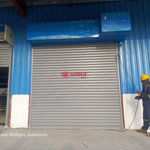Pemasangan Rolling Door Electric Ketebalan 1,2 mm di PT Unilever Medan oleh Nirwana Group Surabaya